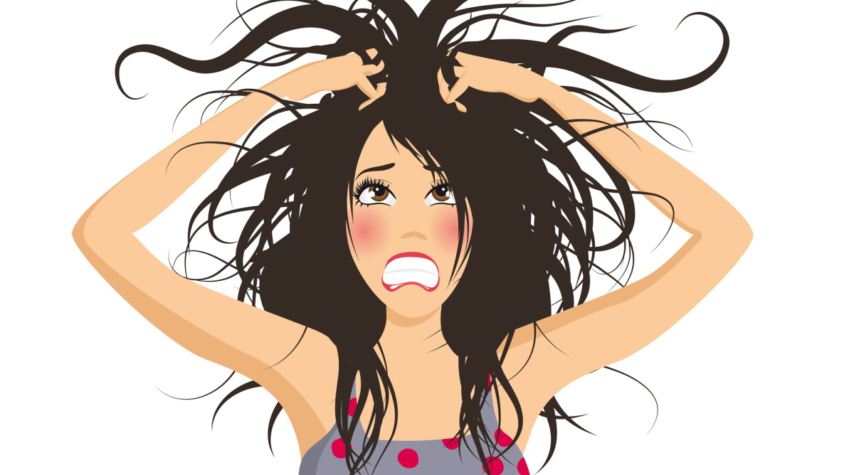 a woman pulling her hair out